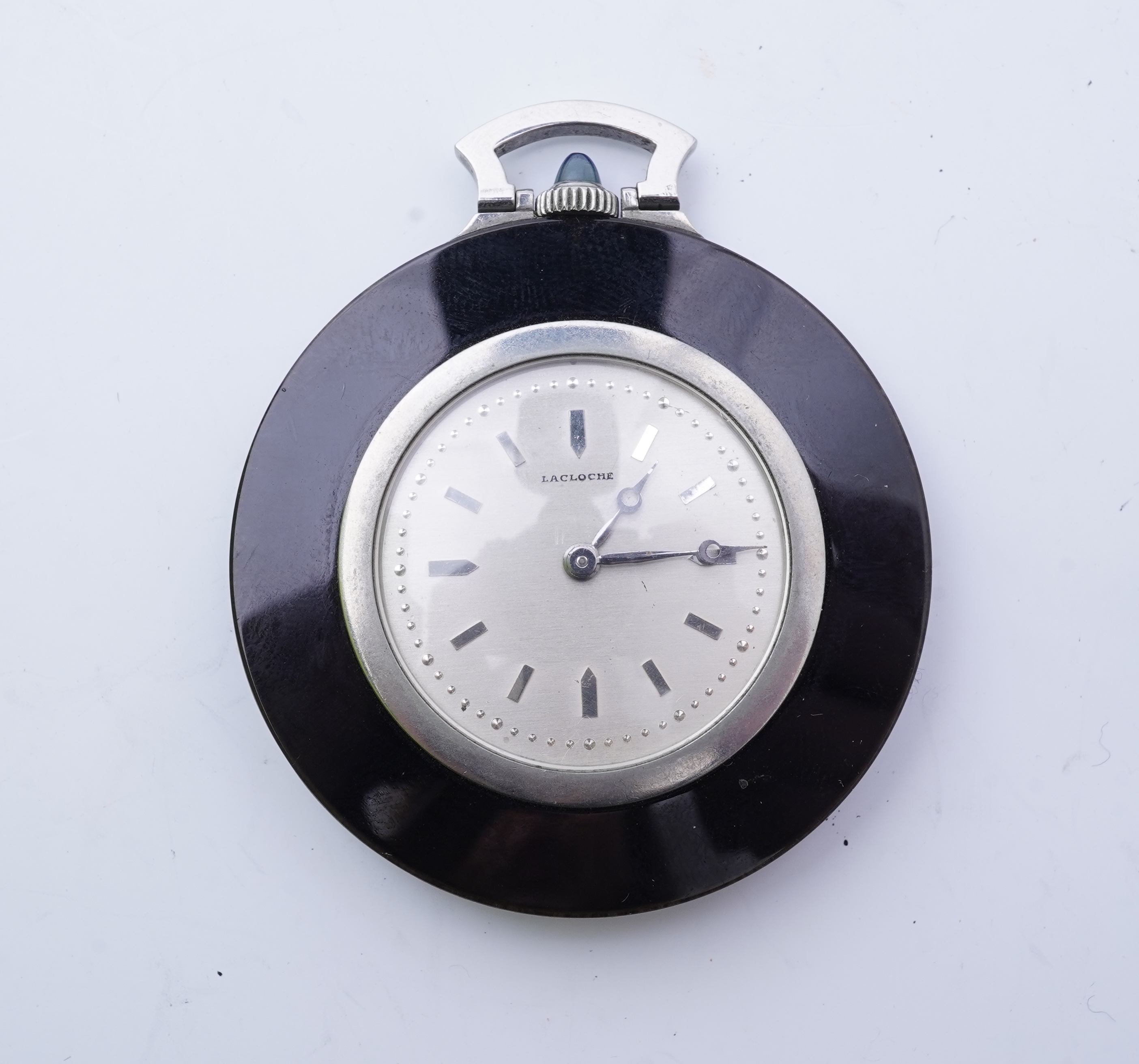 Lacloche Frères, an Art Deco onyx and sapphire pocket watch, circa 1925